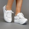 opop-stoere-witte-plateau-sneakers-met-glam-detail.jpg